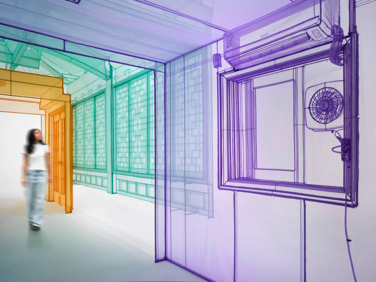 A photo of a blurry woman walking through a colourful fabric tunnel. The fabric is so thin it can be seen through, and the walls look like those of various houses. As the style of the house changes, so does the colour of the fabric, changing from orange to