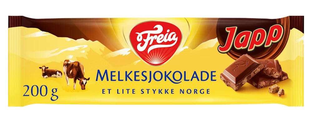 A photo of a chocolate bar wrapper. The bar is much longer than it is wide, and the label states it is melkesjokolade by the brand Freia. The primary colour of the label is yellow, with accents of brown and red. Illustrations are shown of cows grazing. And