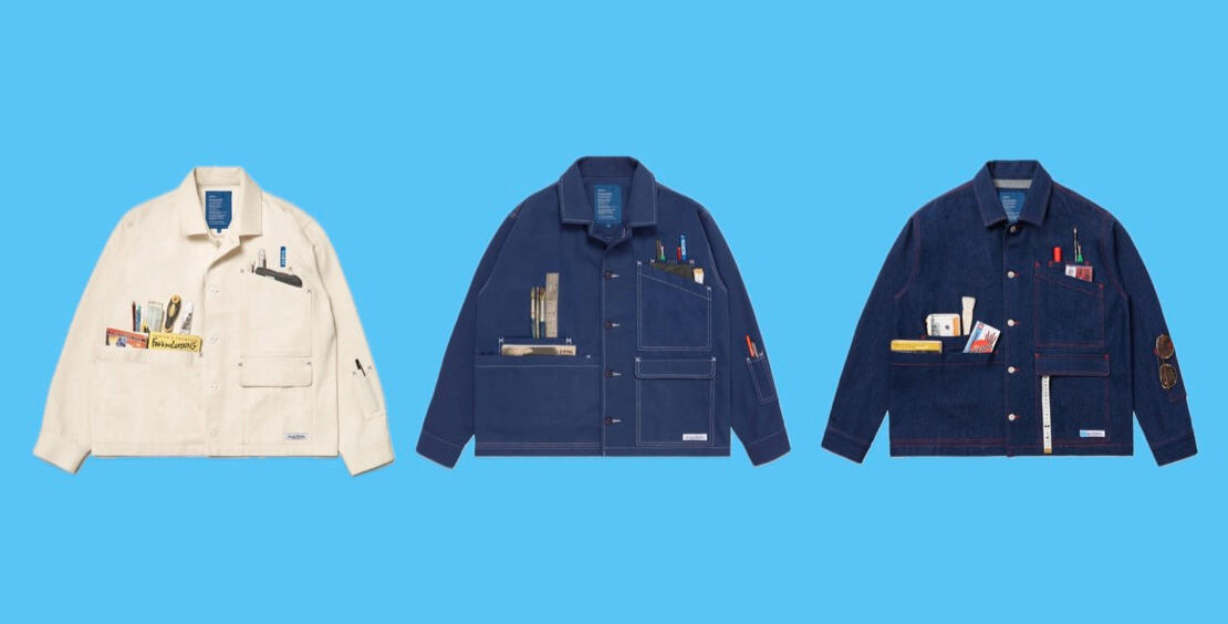 An image of three workwear style jackets on a light blue background. One is ecru, another is dark blue, and the last is navy denim.